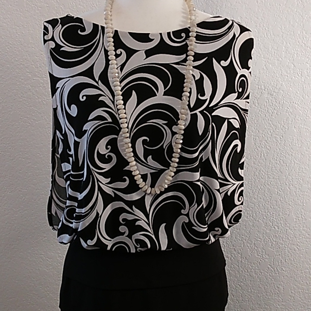 Blouson Style, Sleeveless Cocktail Dress in black and white by Enfocus Studio.